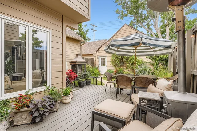 a outdoor living space with furniture and a potted plant