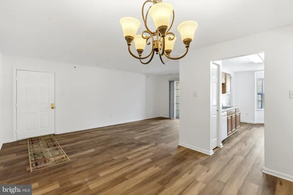 a view of a livingroom with wooden floor