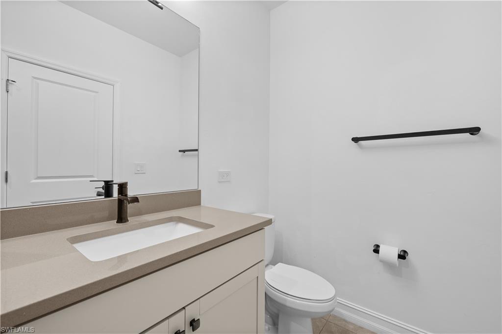 7548 Carnegie Way Naples, FL 34119 - Photo 16 of 20 Guest bathroom