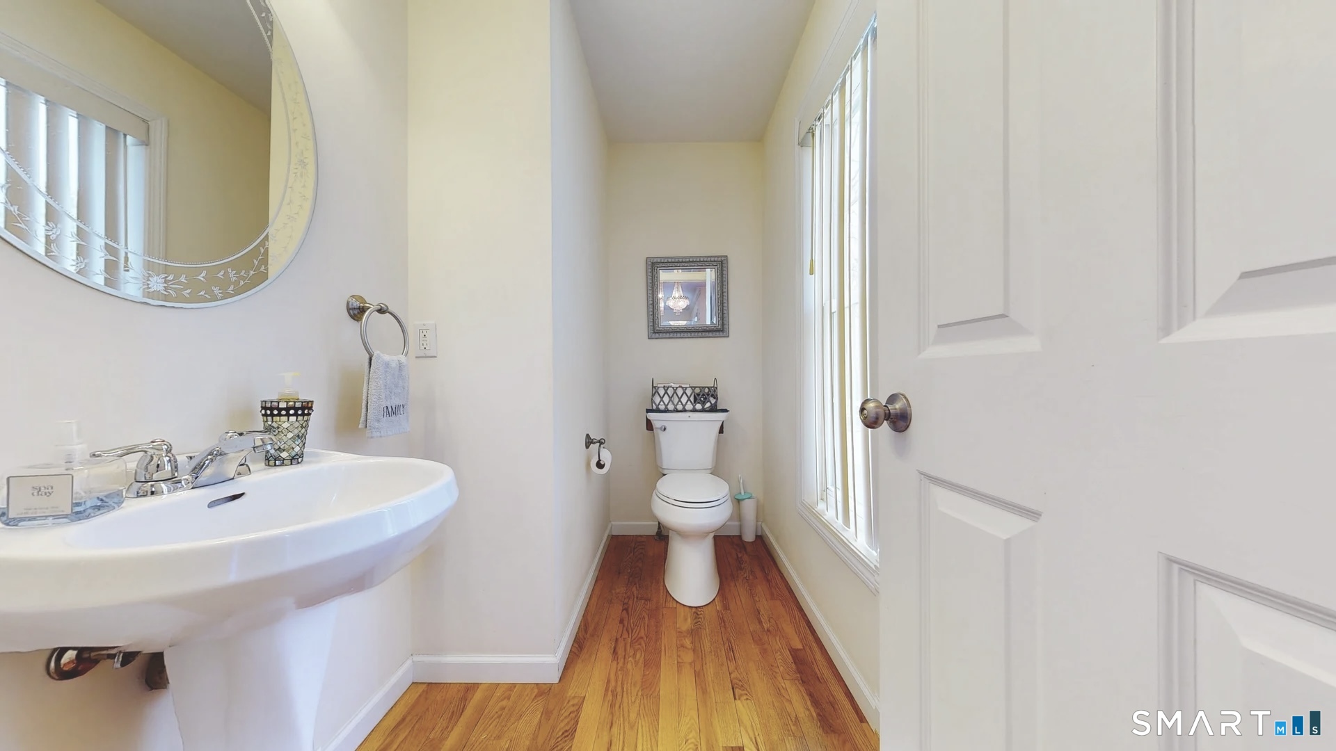 25 Stephen Street Derby, CT 06418 - Photo 11 of 29 a bathroom with a sink and a mirror