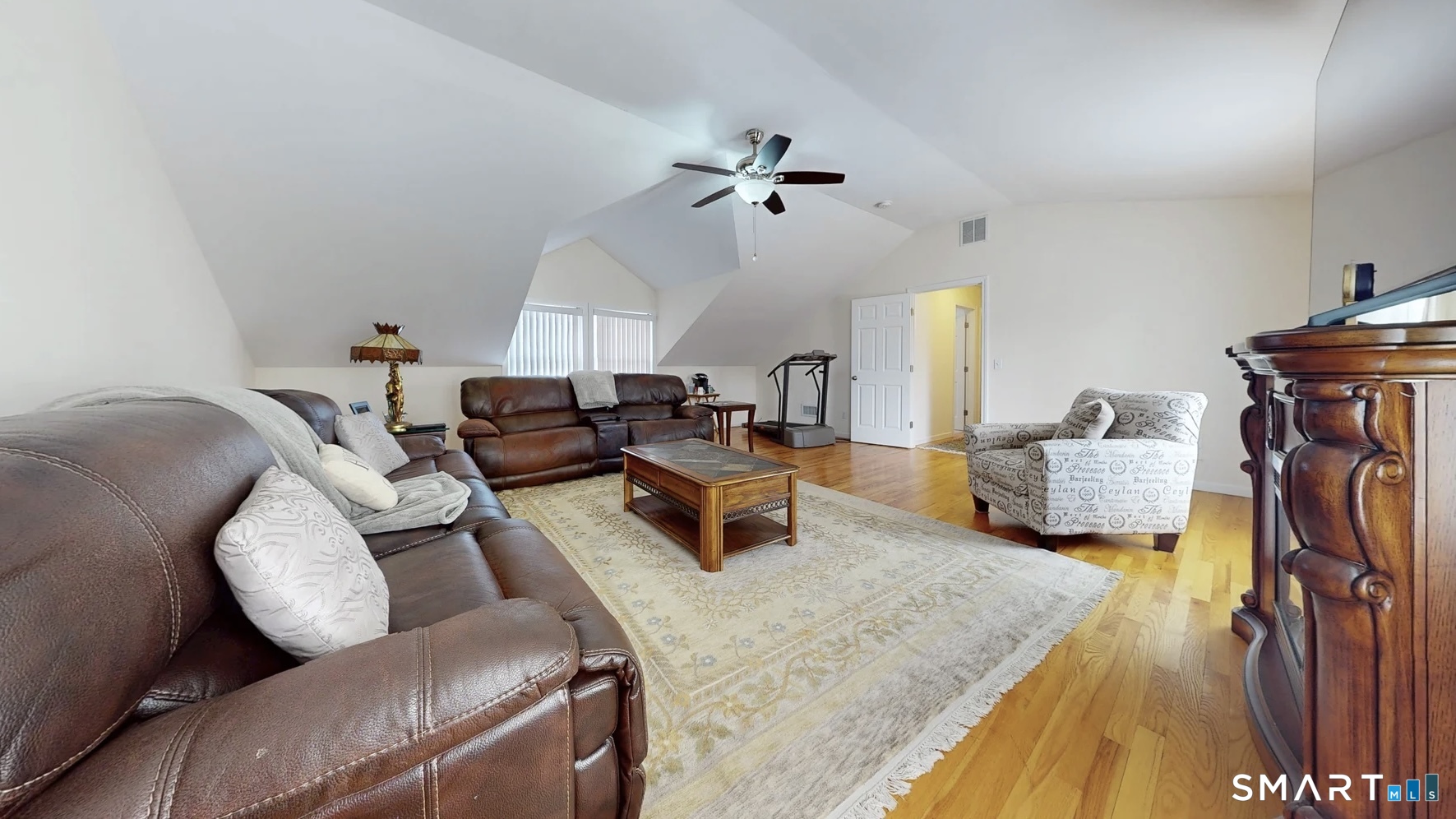 25 Stephen Street Derby, CT 06418 - Photo 21 of 29 a bedroom with furniture and a chandelier