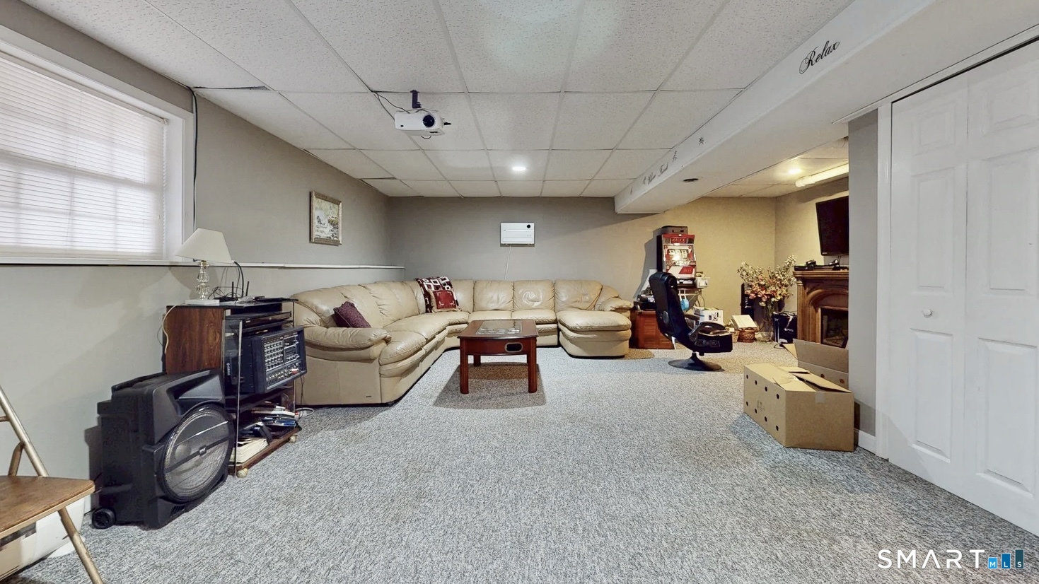 25 Stephen Street Derby, CT 06418 - Photo 24 of 29 a living room with furniture and a gym machine