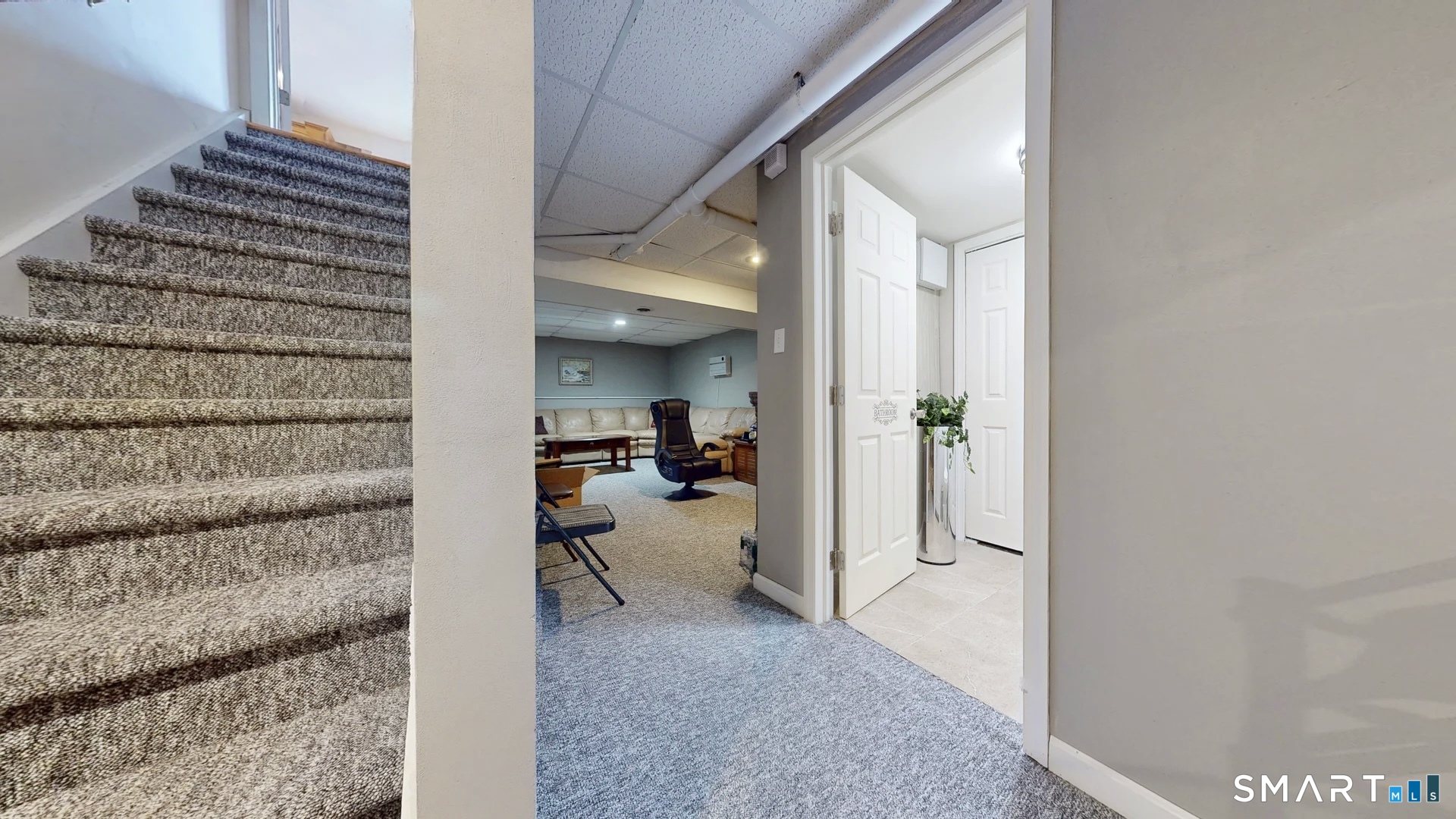25 Stephen Street Derby, CT 06418 - Photo 26 of 29 a view of a hallway with wooden floor and furniture