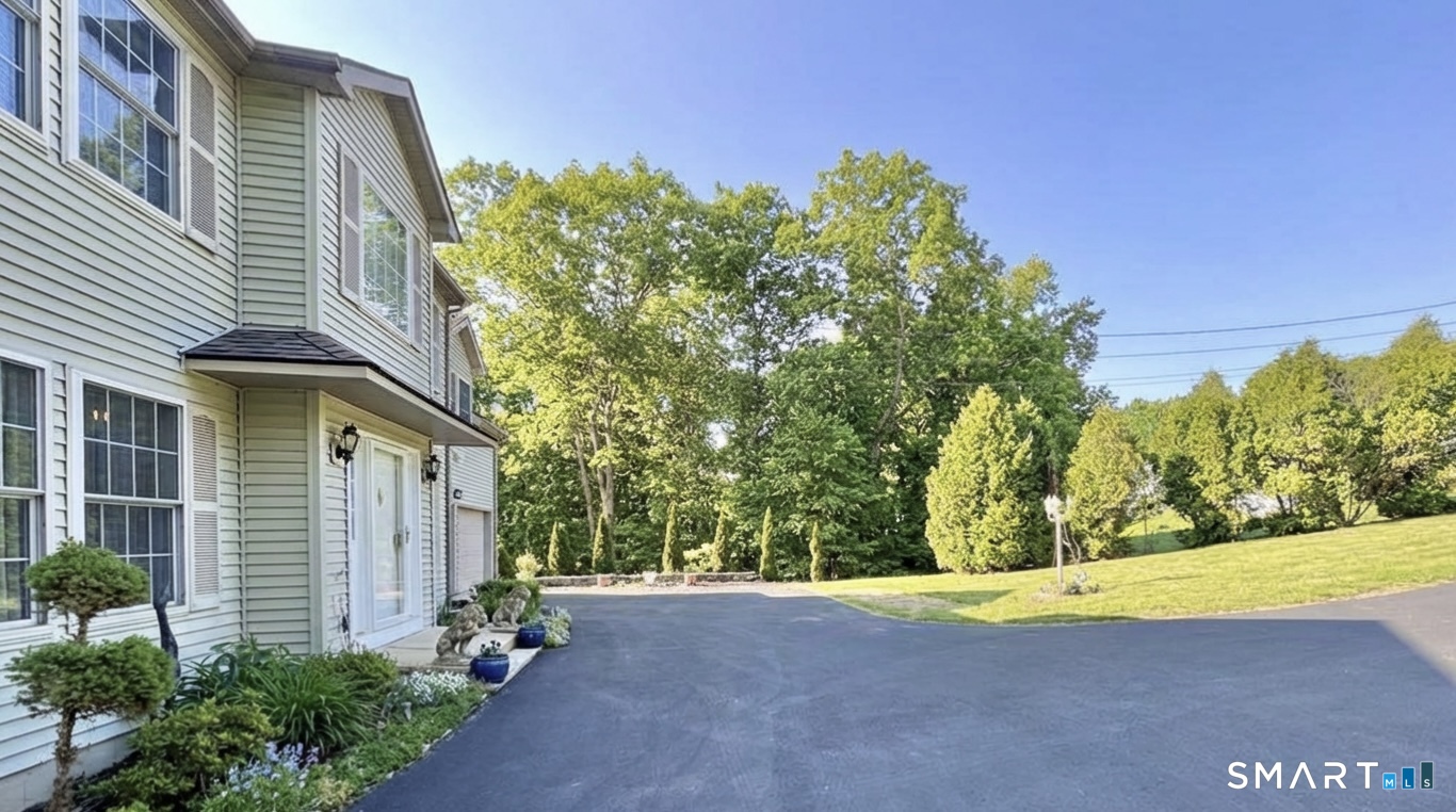 25 Stephen Street Derby, CT 06418 - Photo 28 of 29 a view of a house with backyard and tree