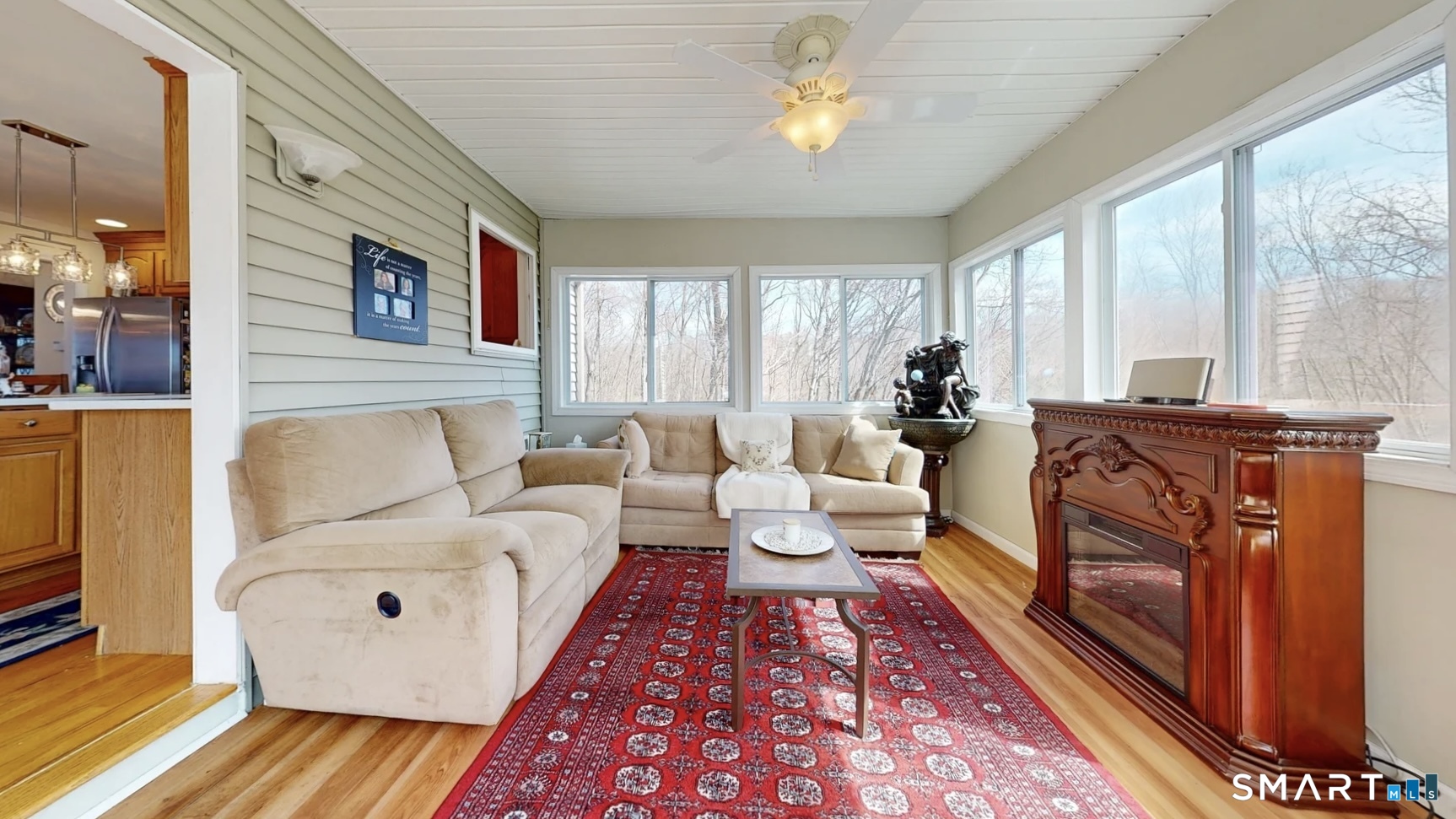 25 Stephen Street Derby, CT 06418 - Photo 7 of 29 a living room with furniture and a fireplace