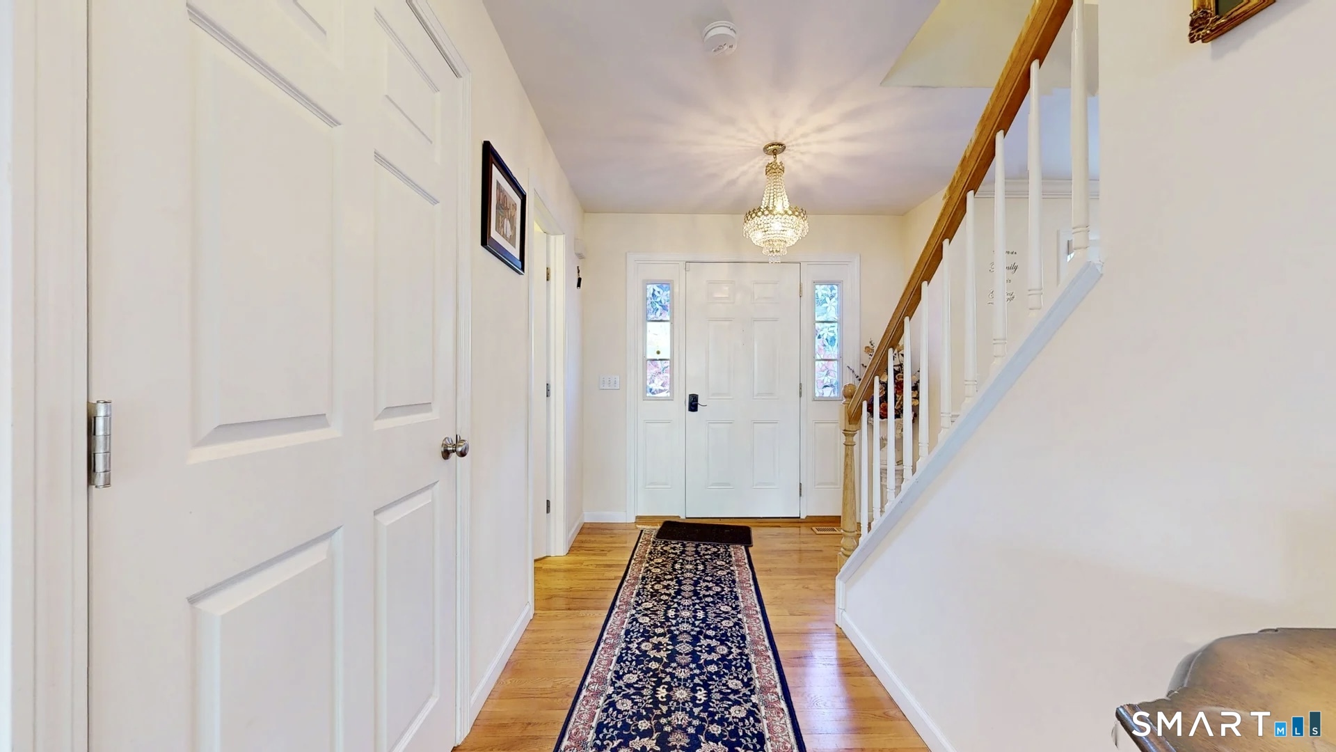 25 Stephen Street Derby, CT 06418 - Photo 9 of 29 a view of hallway with wooden floor