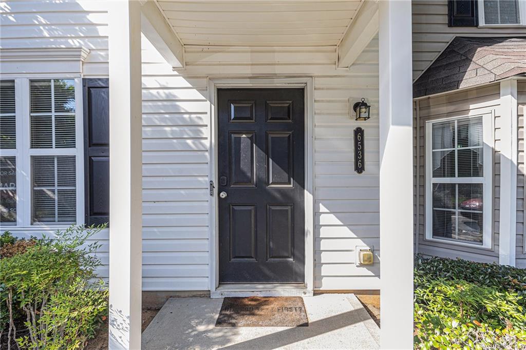 6536 Arbor Gate Drive Southwest, Unit 2 Mableton, GA 30126 - Photo 2 of 27 a view of a entryway door front of house