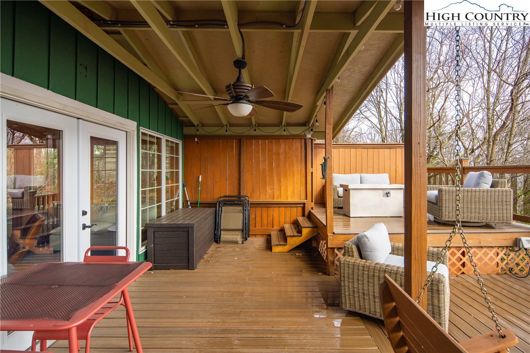 280 Chinkapin Ridge Road Seven Devils, NC 28604 - Photo 26 of 36 a view of a porch with furniture