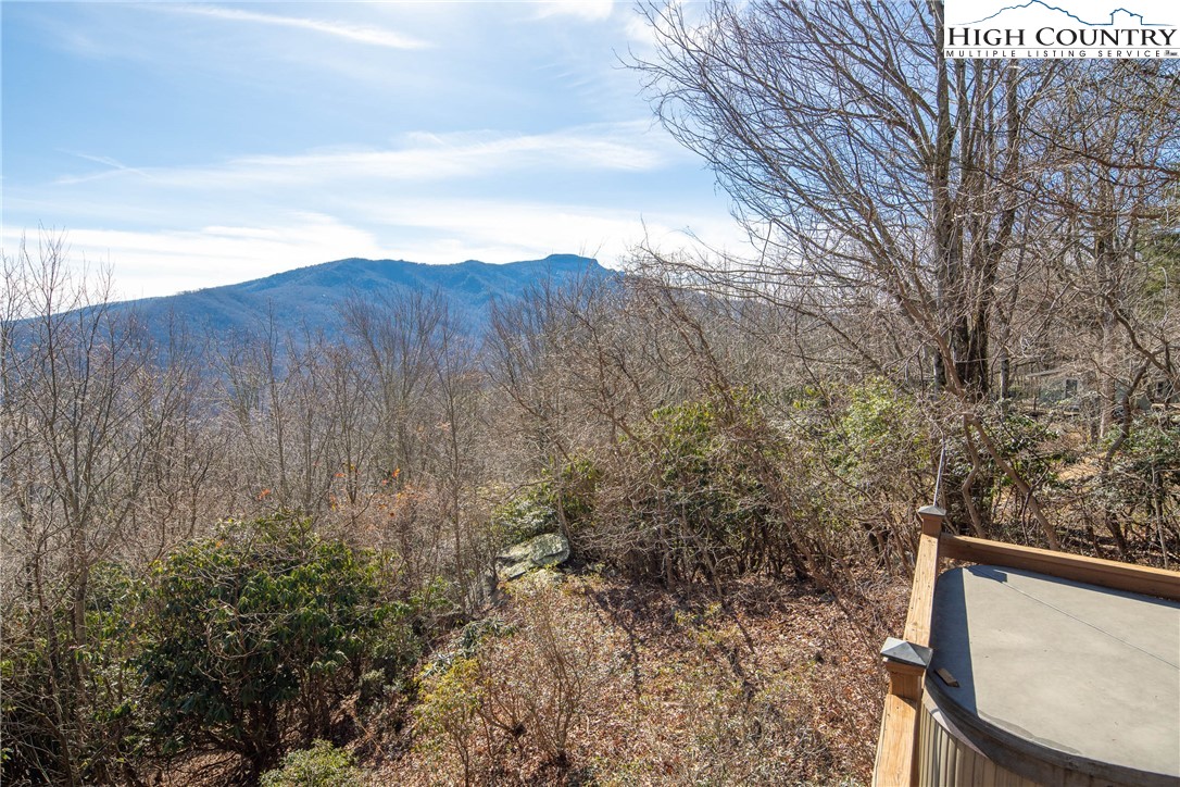 280 Chinkapin Ridge Road Seven Devils, NC 28604 - Photo 30 of 36 a view of a back yard from a balcony