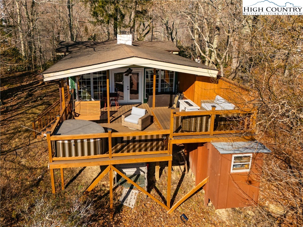 280 Chinkapin Ridge Road Seven Devils, NC 28604 - Photo 35 of 36 front view of a house with a yard