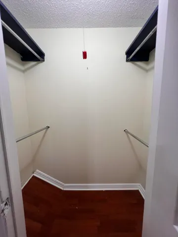 a view of small space with wooden floor