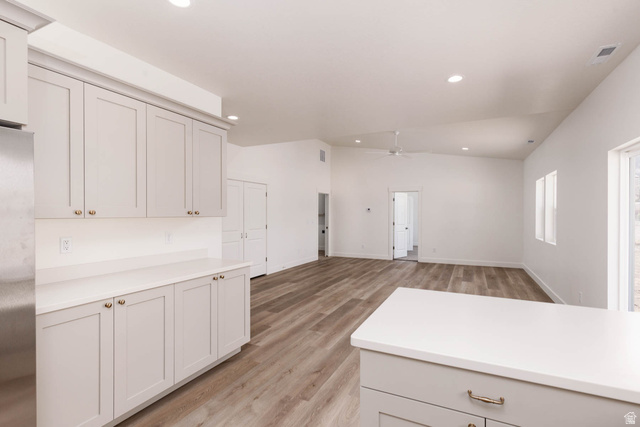 51 West 500 South Monroe, UT 84754 - Photo 15 of 41 Kitchen featuring light gray cabinetry with gold-toned hardware, white countertops, and stainless steel appliances