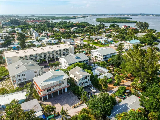 an aerial view of a city with lots of residential buildings