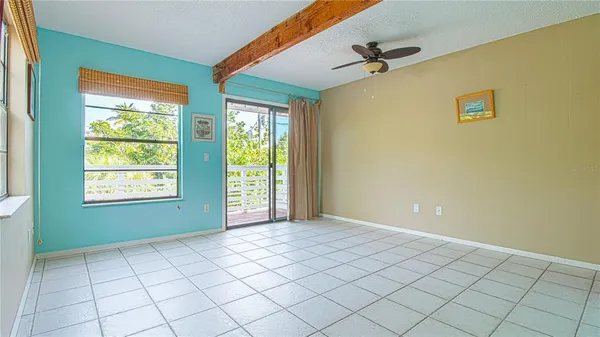 a view of an empty room and window