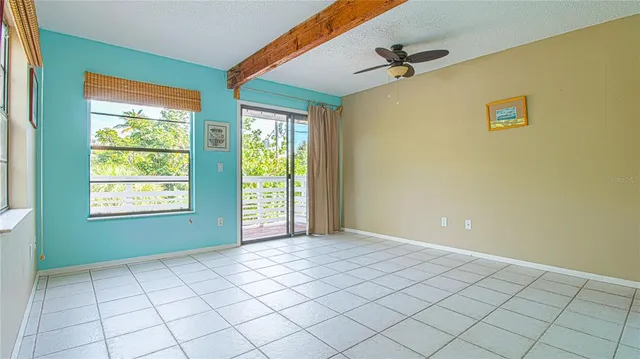 a view of an empty room and window