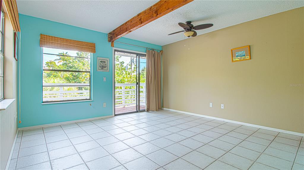60 Beachcomber Lane, Unit 7 Englewood, FL 34223 - Photo 10 of 19 a view of an empty room and window