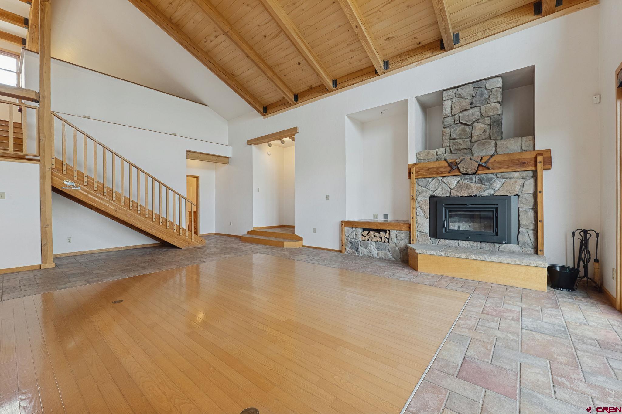 481 Far View Road Durango, CO 81303 - Photo 12 of 44 a view of an empty room with a fireplace