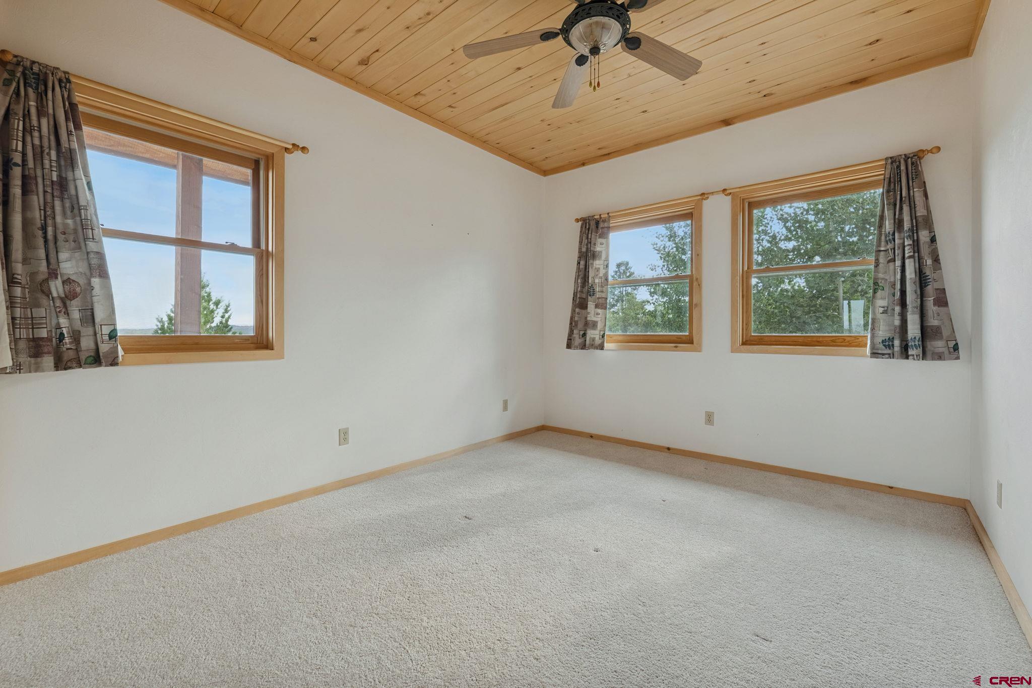 481 Far View Road Durango, CO 81303 - Photo 26 of 44 an empty room with a window
