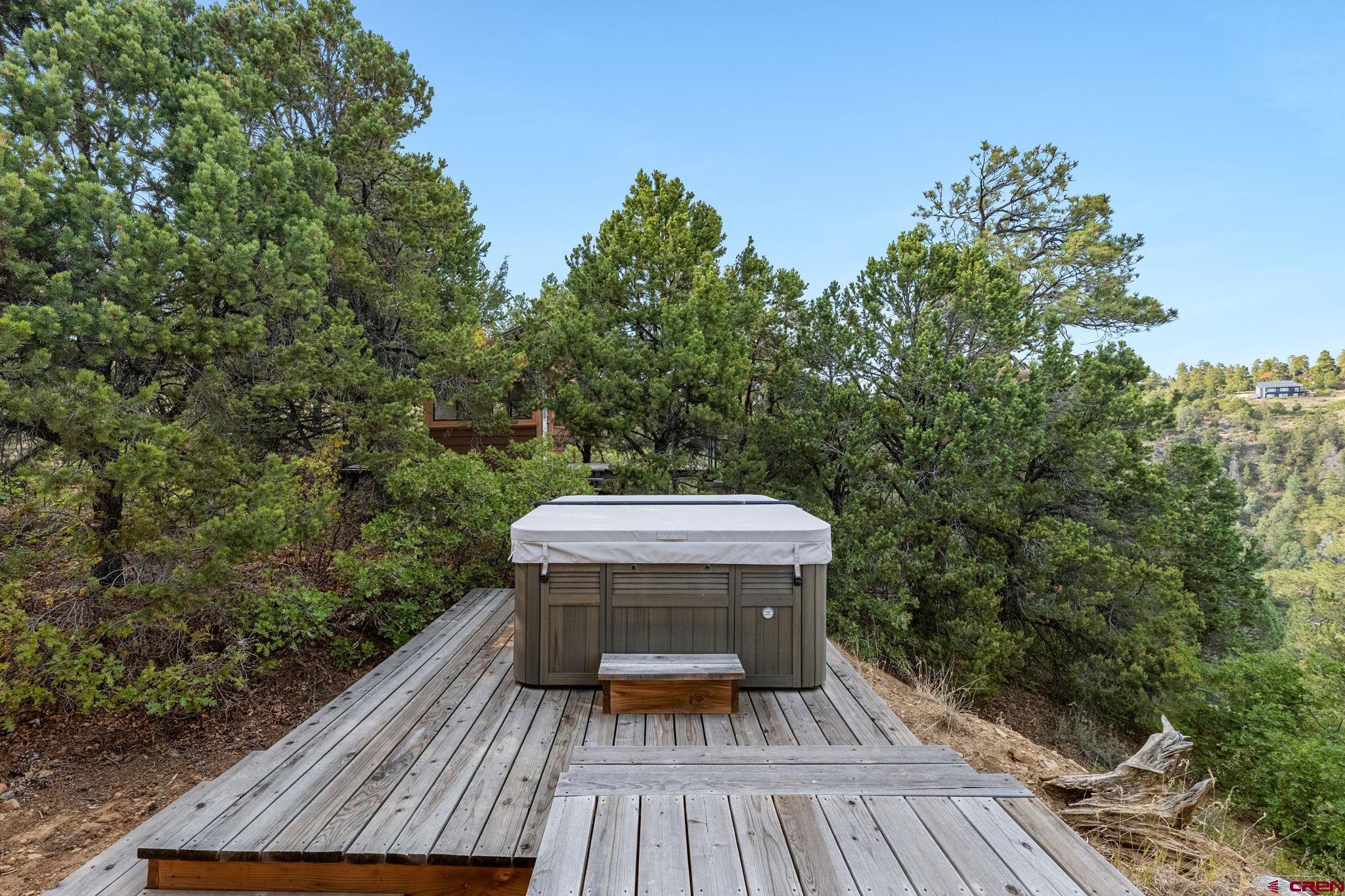 481 Far View Road Durango, CO 81303 - Photo 35 of 44 a view of balcony with wooden floor and outdoor seating