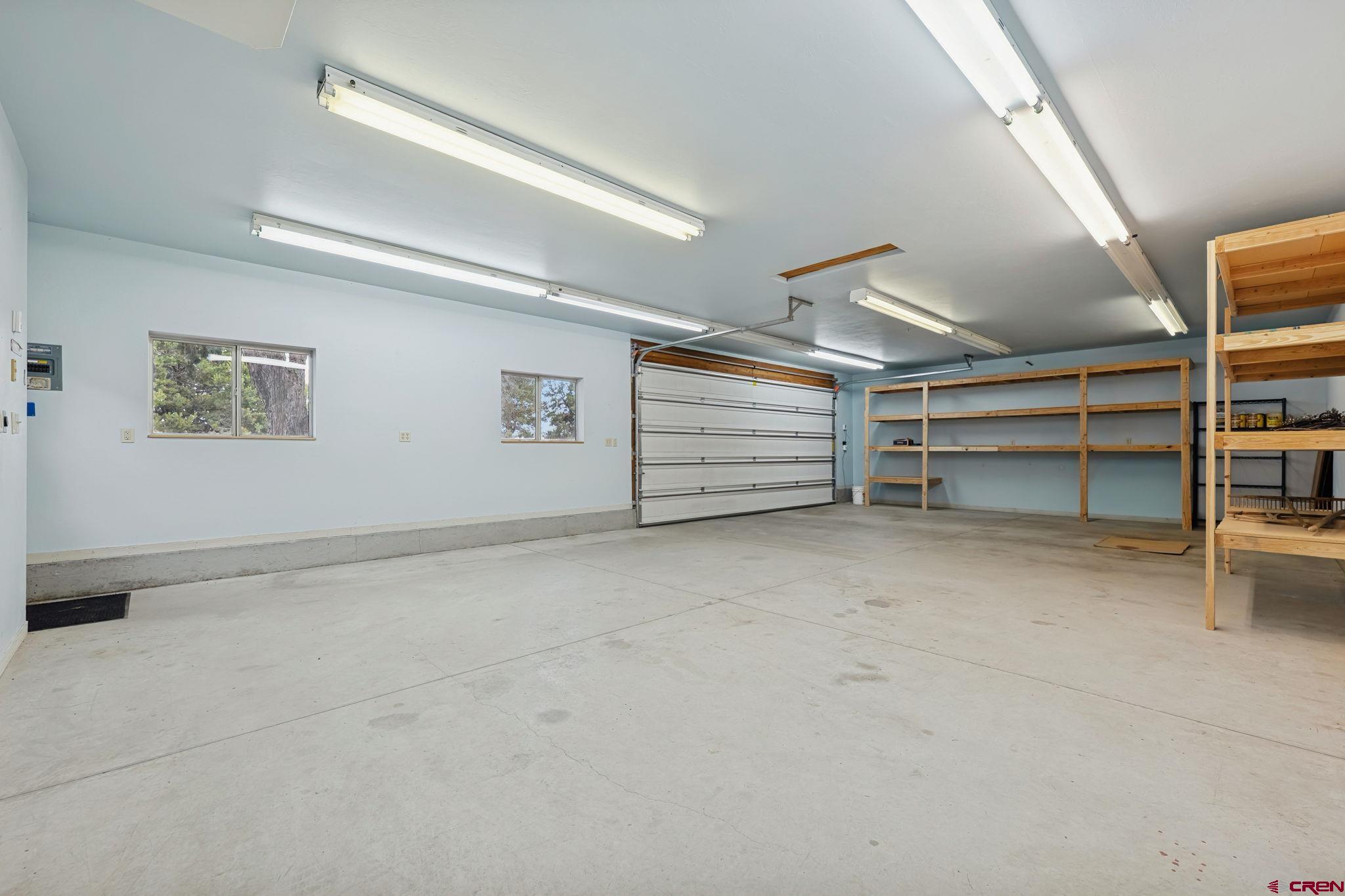 481 Far View Road Durango, CO 81303 - Photo 42 of 44 a view of an empty room with a white cabinet