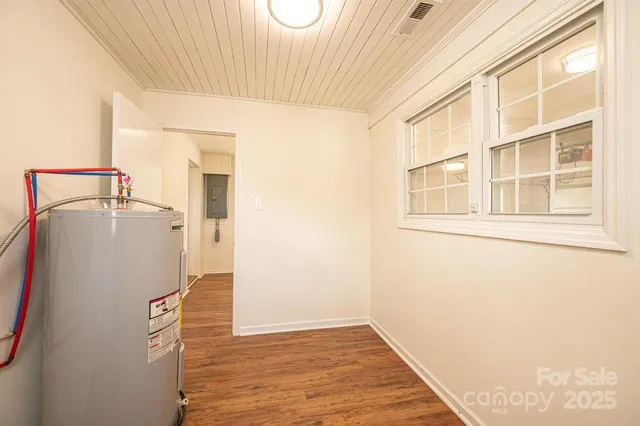 a view of a storage & utility room with a sink