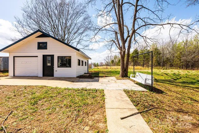 a view of empty room with windows