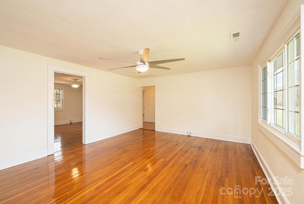 1993 Moss Farm Road Hickory, NC 28602 - Photo 4 of 36 a view of a livingroom with wooden floor