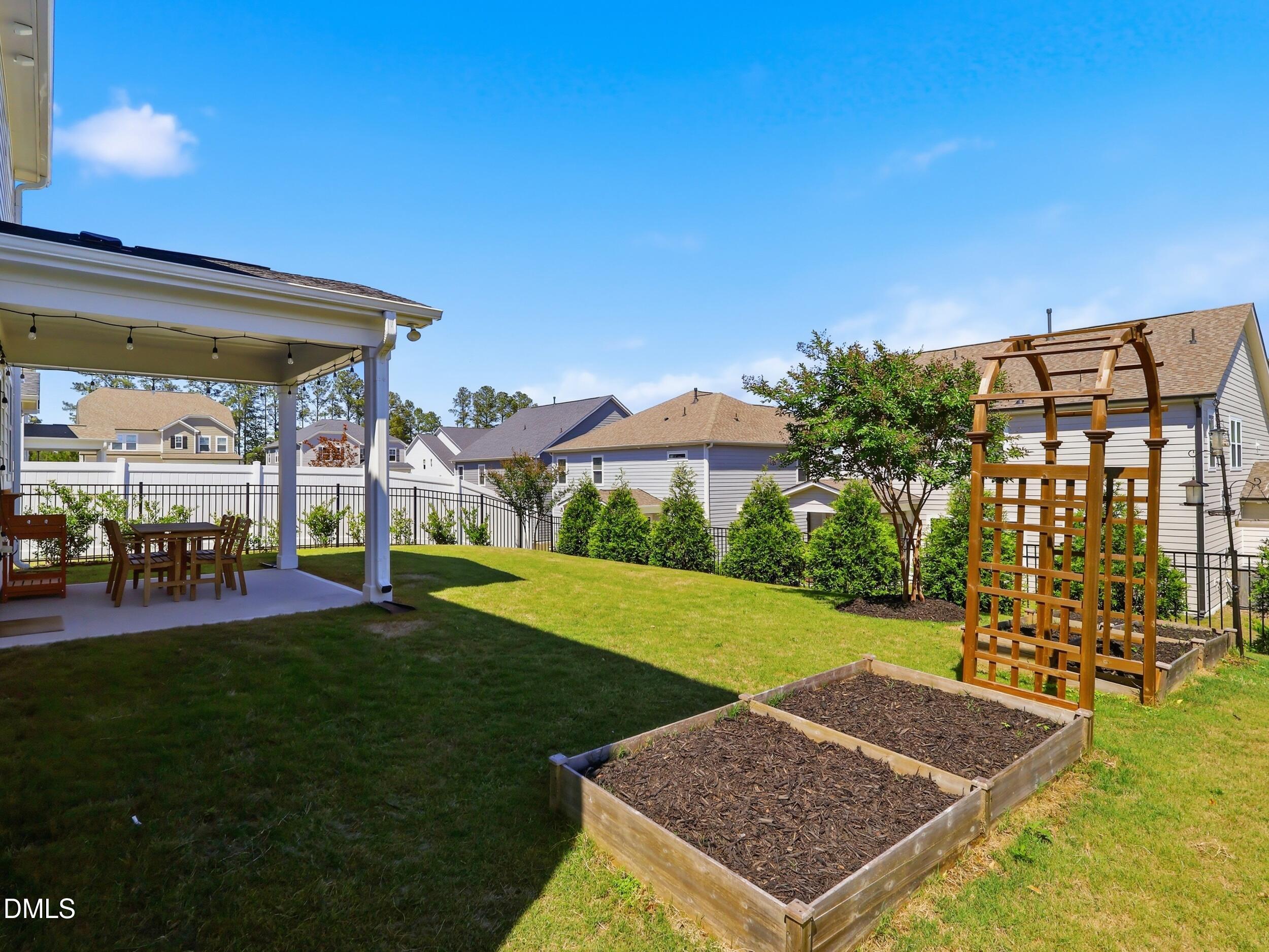 2709 Womble Ridge Drive New Hill, NC 27562 - Photo 48 of 60 a view of outdoor space yard and patio