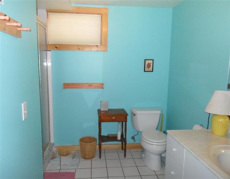 95 Spring Valley Road Wellfleet, MA 02667 - Photo 8 of 27 a bathroom with a toilet and a sink