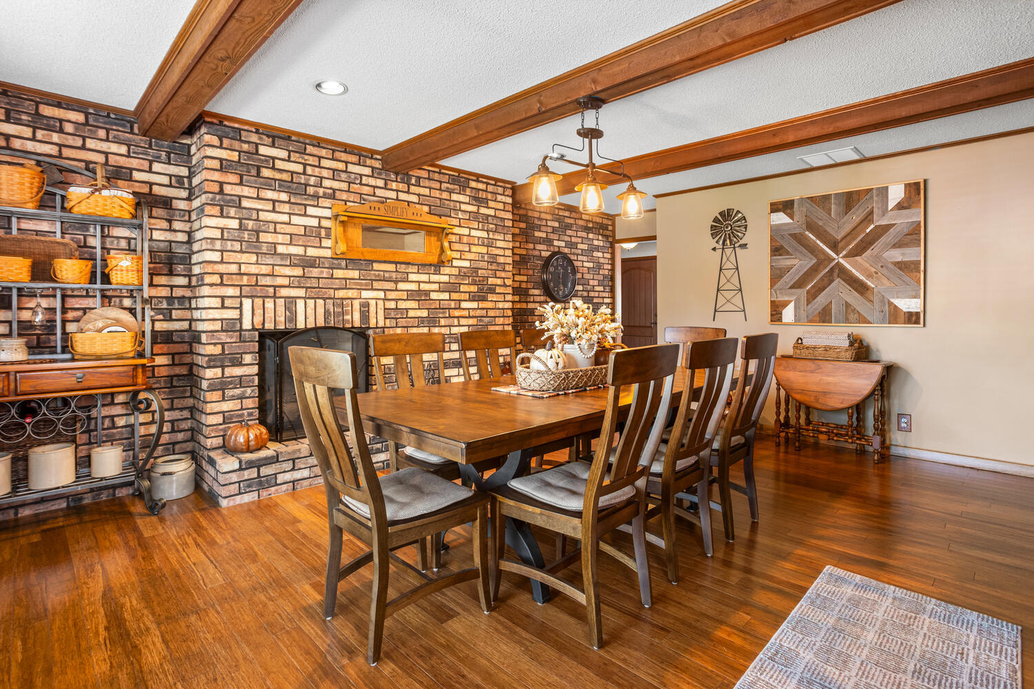 1437 Golf Terrace Danville, IL 61832 - Photo 18 of 40 a view of a dining room with furniture and wooden floor