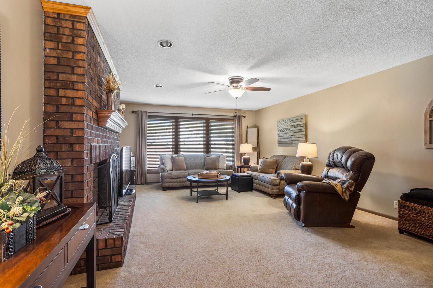 1437 Golf Terrace Danville, IL 61832 - Photo 19 of 40 a living room with furniture and a fireplace