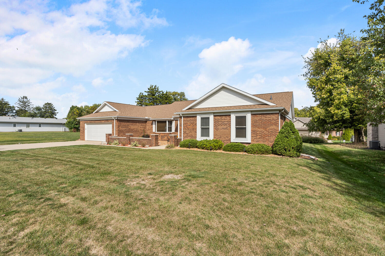 1437 Golf Terrace Danville, IL 61832 - Photo 2 of 40 a front view of a house with a garden