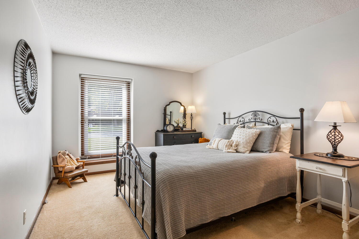 1437 Golf Terrace Danville, IL 61832 - Photo 27 of 40 a bedroom with a bed and a lamp on table