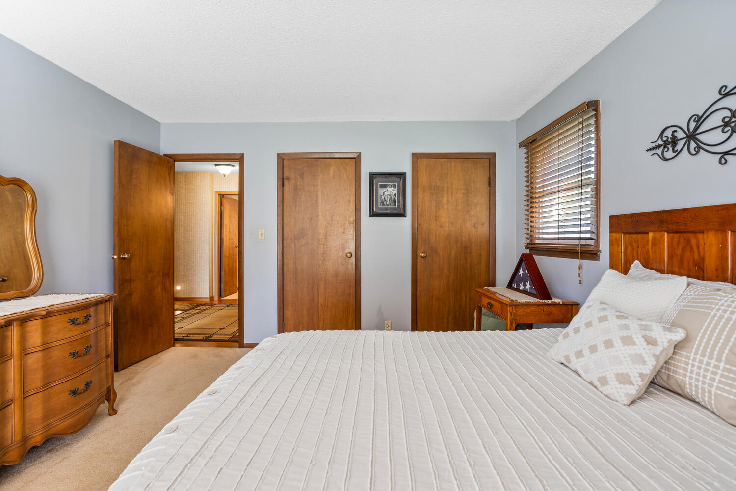 1437 Golf Terrace Danville, IL 61832 - Photo 32 of 40 a bedroom with a bed and a dresser