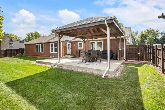 a view of a backyard with a garden
