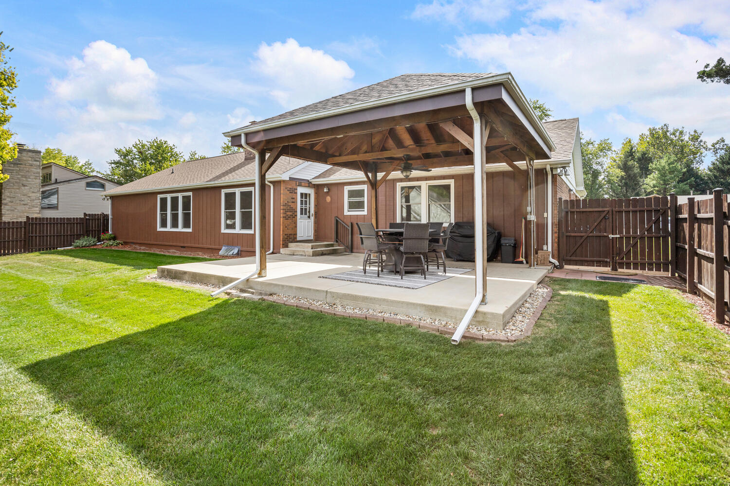 1437 Golf Terrace Danville, IL 61832 - Photo 37 of 40 a view of a house with a yard patio and a patio