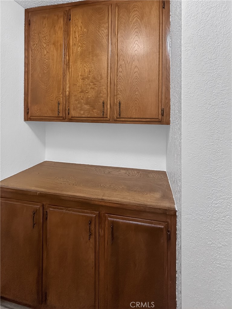 7451 Diamond Street Riverside, CA 92504 - Photo 13 of 31 HALLWAY CABINET STORAGE