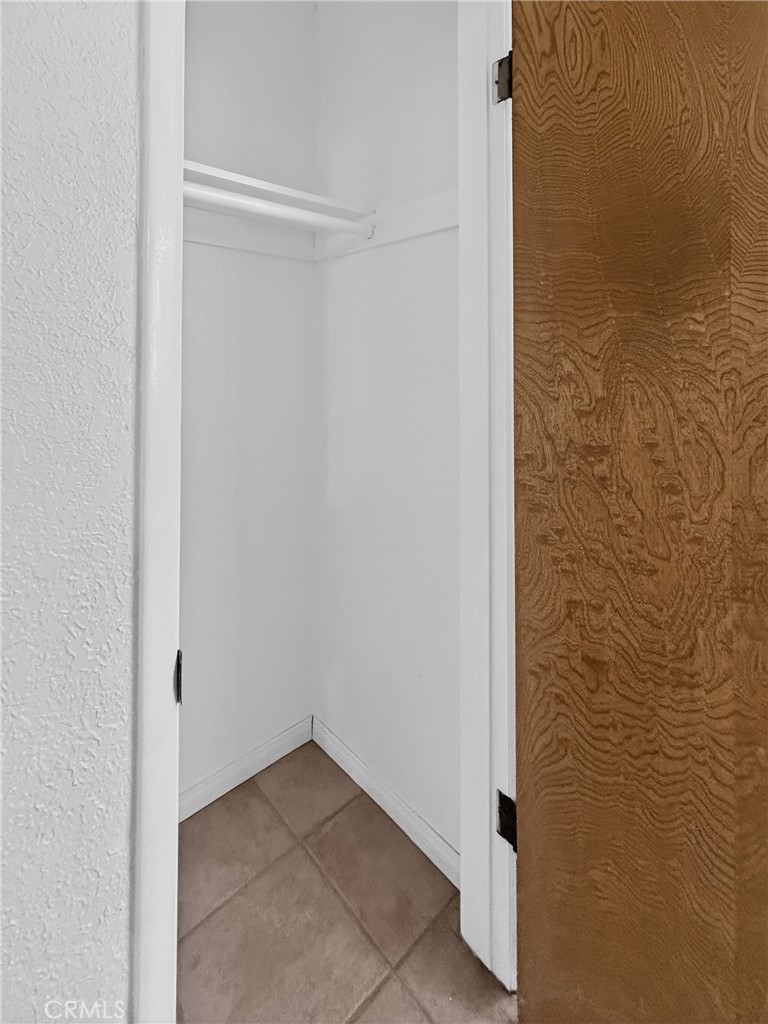 7451 Diamond Street Riverside, CA 92504 - Photo 14 of 31 HALLWAY CLOSET STORAGE