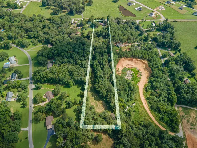 an aerial view of a residential houses