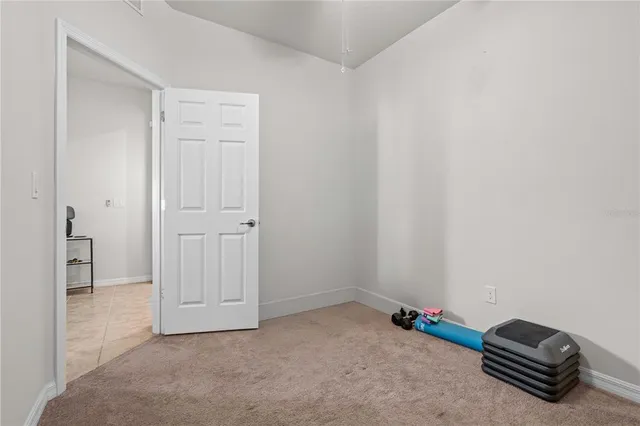 a room with a small space and a wooden floor