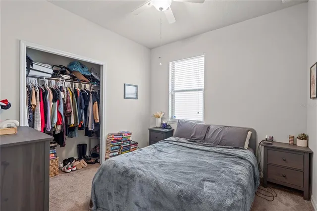 a bathroom with a mirror shower vanity and a sink