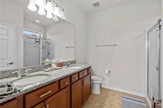 a utility room with lots of clutter and storage