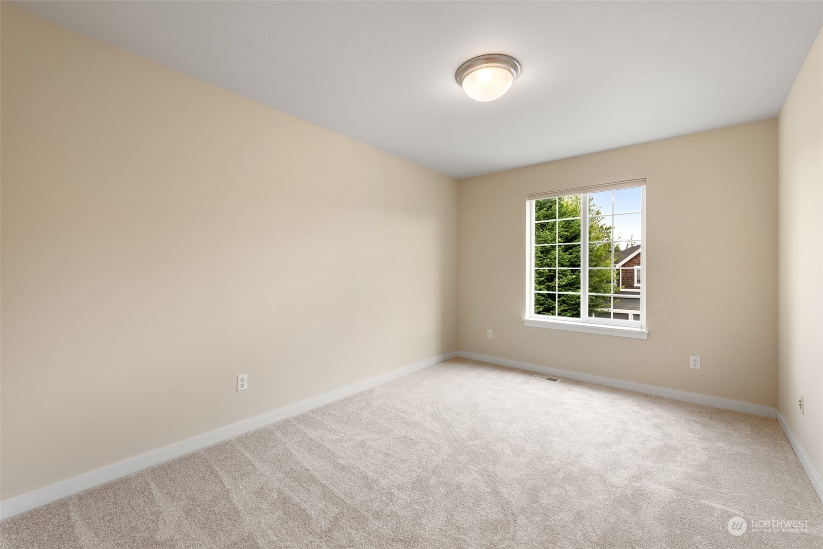 4022 220th Street Southeast Bothell, WA 98021 - Photo 18 of 24 an empty room with a window
