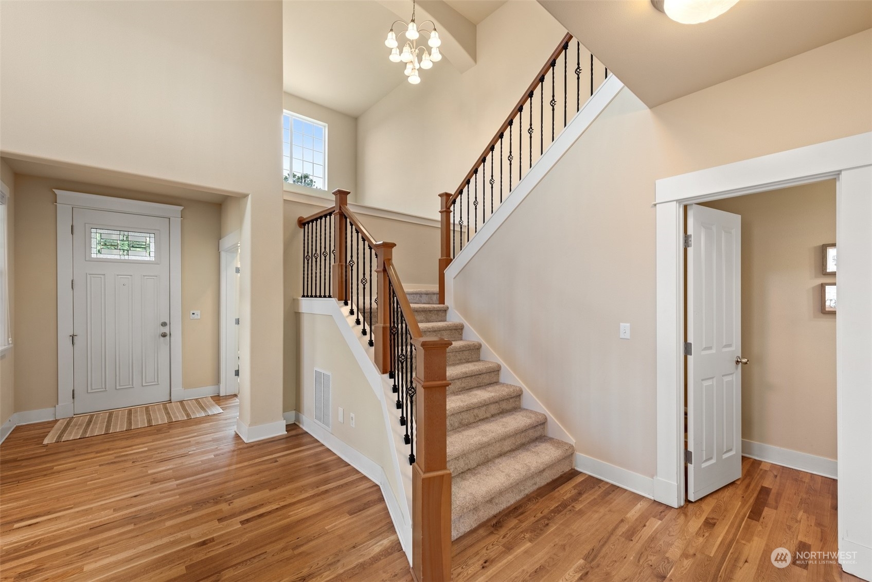 4022 220th Street Southeast Bothell, WA 98021 - Photo 3 of 24 a view of entryway and hall with wooden floor