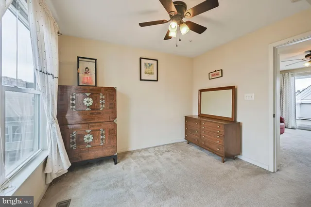 a view of a livingroom with furniture