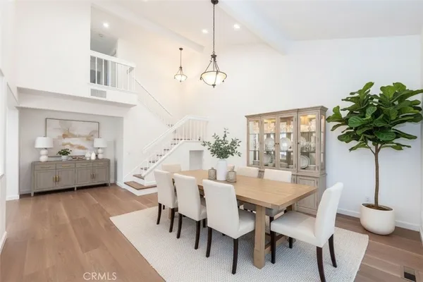 a view of a dining room with furniture window and flowerpot