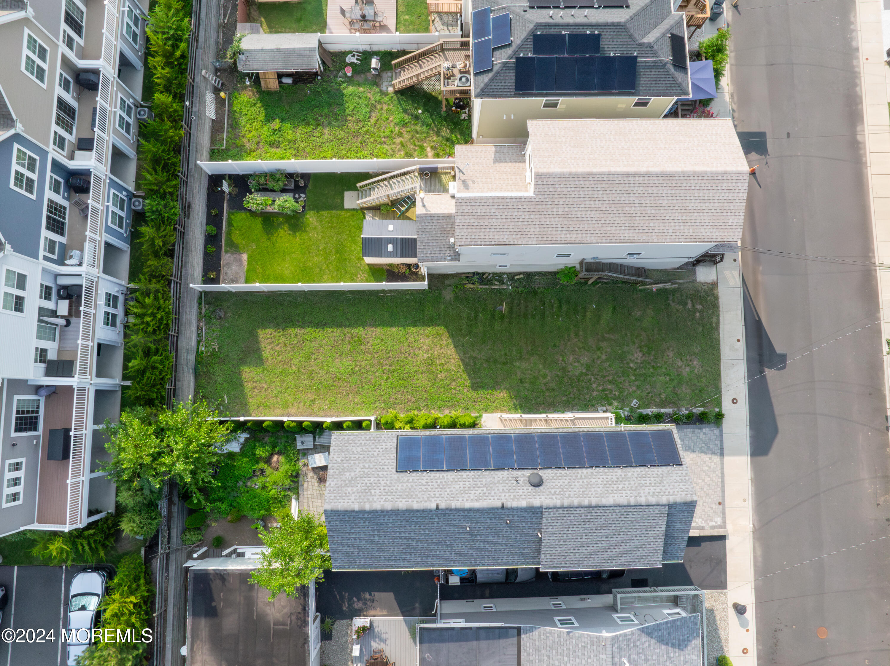 17 Locust Street Highlands, NJ 07732 - Photo 3 of 31 an aerial view of a house with a yard pool outdoor seating and yard