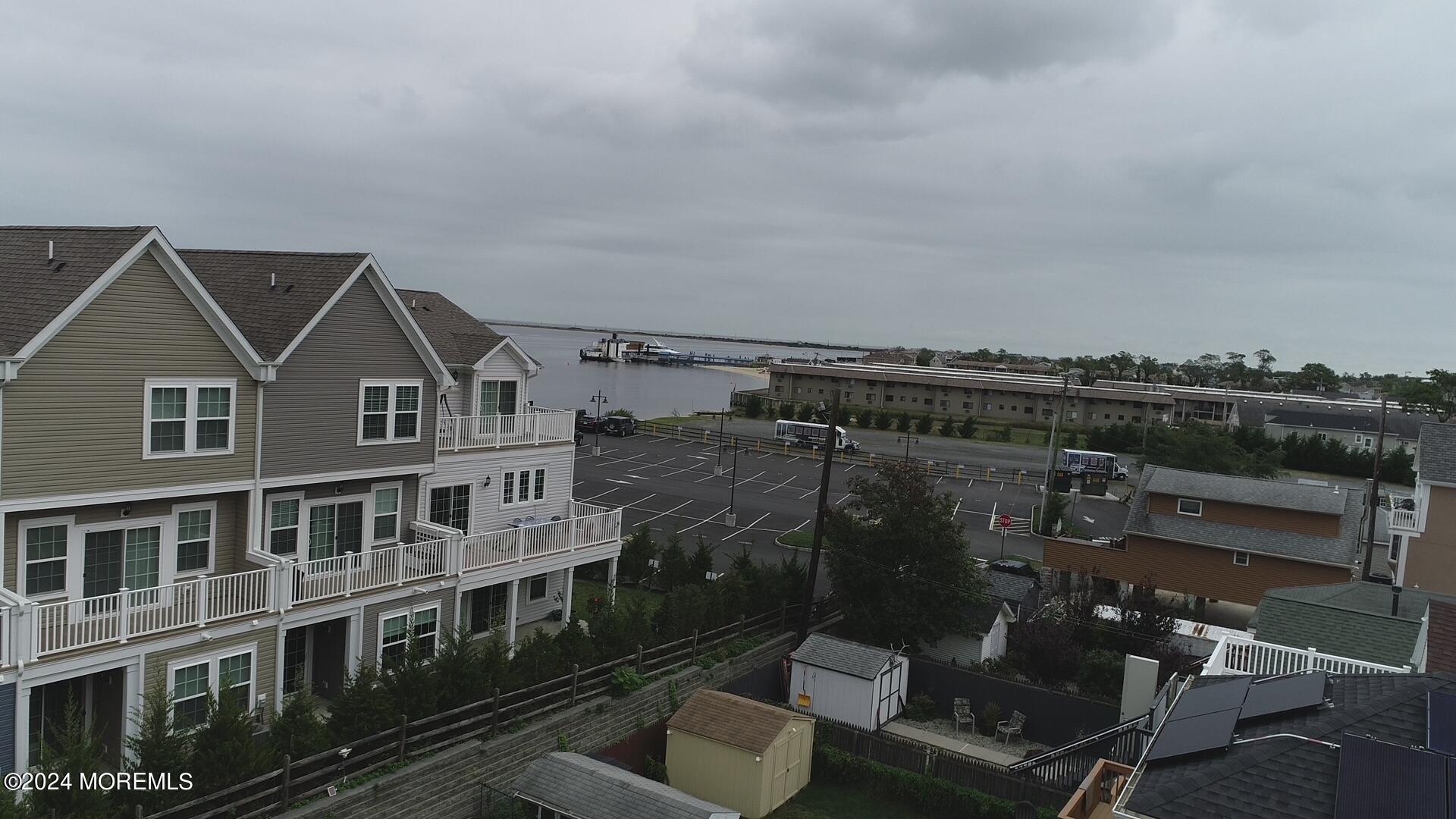 17 Locust Street Highlands, NJ 07732 - Photo 5 of 31 a view of a house with a balcony