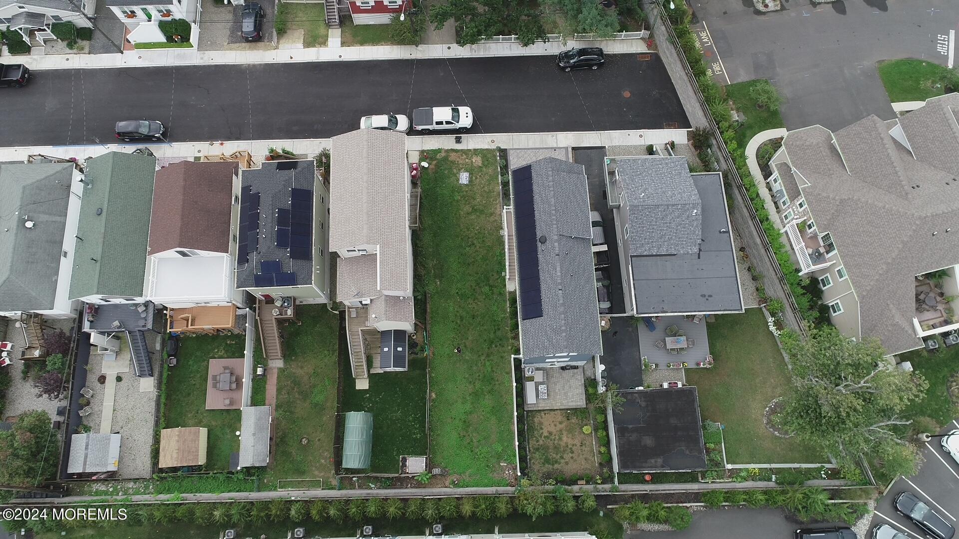 17 Locust Street Highlands, NJ 07732 - Photo 7 of 31 an aerial view of multiple house
