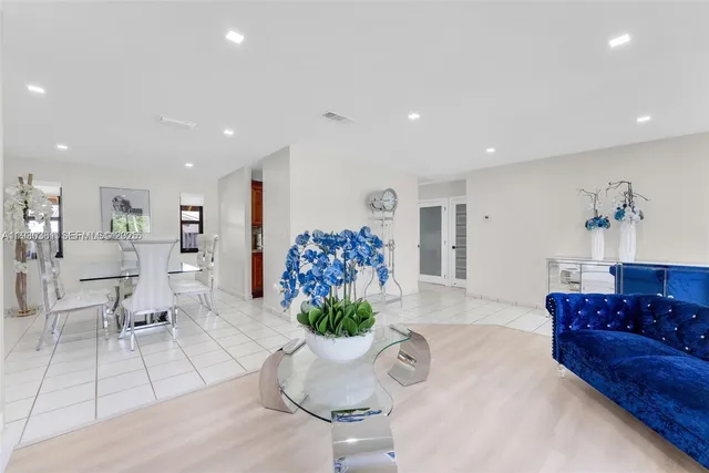 a living room with furniture and a table